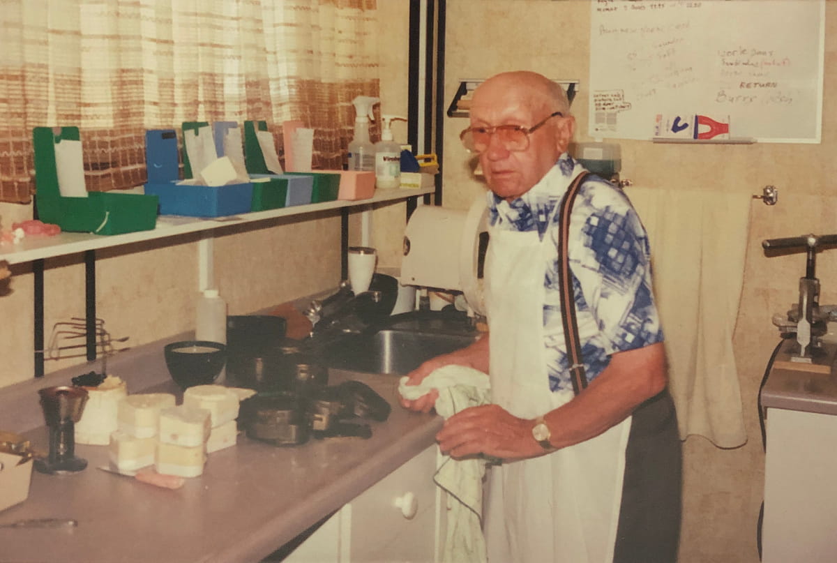 Lab assistant Joe Schankula, Sr., Tim's grandfather, in the lab cleaning denture flasks