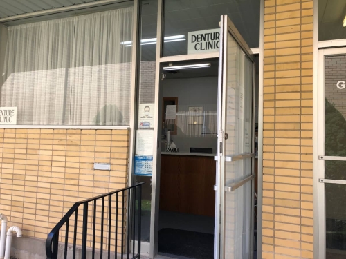 Our front door wide open, looking a bit into our reception area from outside